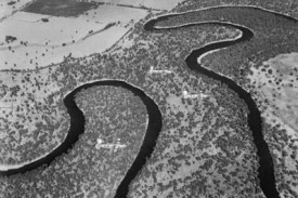 Formation over a meandering river
