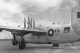 Crew inspecting the port wing